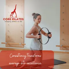 Consistency transforms average into excellence. A client uses the magic circle in our studio, surrounded by equipment that supports her journey.