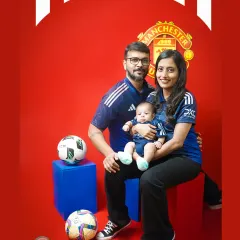 A family of Manchester United fans celebrating their newest team member. We can incorporate your favorite sports, hobbies, or passions into a fun family shoot.