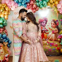 Nothing is cuter than a Krishna-themed Godh Bharai for a little one on the way. The parents-to-be looked divine in front of the vibrant backdrop, surrounded by a rainbow of colorful balloons.