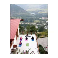 A glimpse into our morning practice during a wellness retreat in Bhutan. We gather on a terrace with an open view of the Punakha valley and its winding rivers. Leading a group yoga session in such a majestic space allows us all to connect more deeply with our breath and each other.
