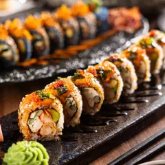 Precision and artistry in a single frame. This close-up on a sushi platter highlights the fresh ingredients and meticulous preparation, creating a clean, high-end visual perfect for a restaurant menu or social media feature.