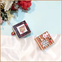 A pair of my tiny scrapbooks, each with a unique theme. One is for a birthday and the other for love, showing how versatile these little keepsakes can be.