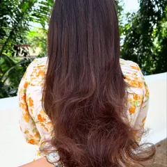 Are you even birthday ready if your hair ain’t done? This transformation involved covering significant grey regrowth and blending it into a rich, youthful brunette color with a fresh cut.