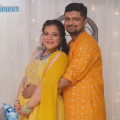 Another shot of this glowing mom-to-be and her partner. The makeup was designed to be flawless and effortless, perfect for capturing these precious memories.