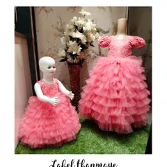 A beautiful pink twinning set with multi-layered ruffled skirts. These gowns are a popular choice for birthday parties and photoshoots, and I can customize them in any color.