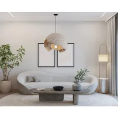 This living room is defined by its organic shapes and textures. The curved sofa, stone-like coffee table, and a statement pendant light made of natural fibers create a serene and earthy ambiance.