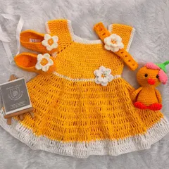 A complete head-to-toe look for a sunny day, this yellow frock set comes with matching floral booties, a headband, and a little duck toy for the perfect photoshoot prop.