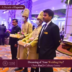Our team of professional servers and chefs, lined up and ready for service. With over a decade of expertise, we orchestrate culinary excellence for your dream wedding day.