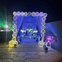 An absolutely magical Sangeet entrance. We constructed this archway with dozens of illuminated wire spheres and a tunnel of hanging crystals, creating a sparkling pathway for guests.