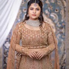 A beautiful model wearing a CZ choker set that perfectly complements her embellished gown. This is a great option for a glamorous evening event.