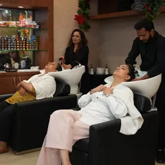 My guests are my true friends. Here, two clients are enjoying a relaxing hair wash side-by-side, sharing a moment of pampering and friendship in my salon.