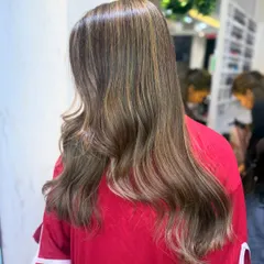 Another angle of the Milk Tea Brown bronde, showing the intricate highlights and the overall cool, ashy tone.