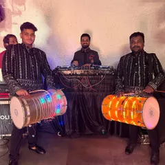 For a truly authentic desi wedding or sangeet, I collaborate with live dhol players. This fusion of my DJ set with live dhol beats creates an electrifying atmosphere for the baraat or dance floor.