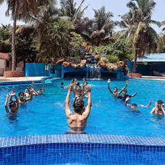 Recovery is as important as training. Here, the team enjoys a hydrotherapy session in the pool, a great way to relax muscles and bond as a team after a tough game.