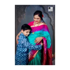 A heartwarming moment between mother and son, as the big-brother-to-be gives a loving hug to the baby bump.
