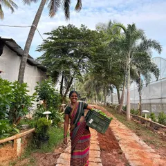 This is Sharanamma, one of the joyful, hardworking members of our team. Her smile reflects the pride we take in our work, bringing fresh produce from our farm to your table.