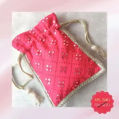 This beautiful mirror-work potli in rani pink is now available at a special clearance price. It's the perfect time to stock up on festive accessories or return gifts.