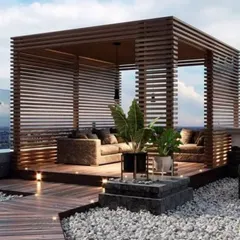A luxurious rooftop lounge built within a custom wooden slat pergola. This design provides privacy and shade while maintaining an open, airy feel, perfect for creating an elegant outdoor seating area with integrated floor and pendant lighting.