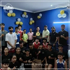 We are proud to be the best boxing club in town. This group photo celebrates our community of members and coaches, the heart of our club, where we train future champions and fitness enthusiasts alike.