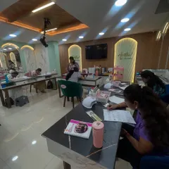 A wide view of our dedicated nail art classroom, fully equipped with all the tools and products students need.