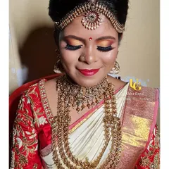 My signature muhurtham makeover. I'll teach you how to layer antique gold jewelry and create a makeup look with warm, fiery eyes and a flawless base that makes you look like a diva.