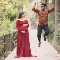 The pure excitement of a dad-to-be. These fun, candid shots during a maternity session capture the joy and anticipation of welcoming a new baby.