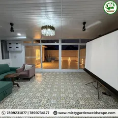 We converted this open terrace at Skylark Greens into a luxurious, fully enclosed room. Featuring a durable PUF sheet pergola, elegant PVC ceiling, and large UPVC sliding doors, this space is now a perfect, comfortable retreat for relaxation and entertainment, protected from the elements.