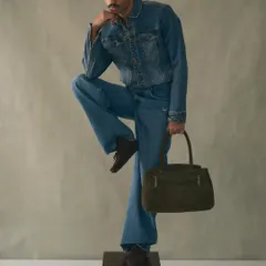 Introducing the Penny Carryall, our first unisex bag. Inspired by the iconic penny loafer, this suede bag embodies soft luxury and structured design.
