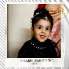 I also do light, age-appropriate makeup for kids for special occasions. This little one is ready for a party with a touch of lipstick and a cute hairstyle.