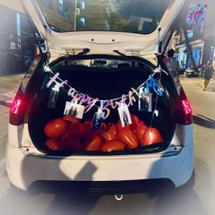 For a surprise that's completely unexpected, we offer our signature car boot decoration. We fill the trunk with balloons, hang a "Happy Birthday" banner, and string up your favorite photos for a reveal that delivers a huge wow factor on the go.