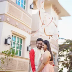 A classic Bollywood-style moment at the luxurious ITC Grand Bharat. The flowing dupatta adds a touch of cinematic drama to this romantic pre-wedding portrait.