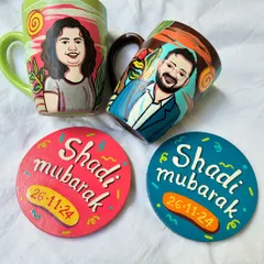 Cute wedding gift ideas. This set includes personalized 'his and hers' mugs and matching 'Shaadi Mubarak' coasters with the wedding date.