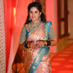 Rashmi making her entrance. The makeup is designed to be flawless from a distance and in motion.