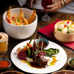 Unlock a world of flavors with our carefully crafted dishes. From New Zealand lamb chops to tempura prawns and delicate dim sum, every meal is a new discovery in culinary innovation.