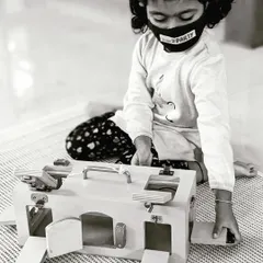 The Little Lock Box is a favorite for developing fine motor skills and problem-solving. It features various real-world locks and latches, giving children a satisfying challenge that enhances their hand-eye coordination and practical life skills.