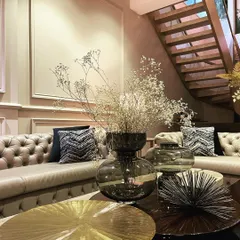 A sneak peek into a formal living room I designed in Greater Kailash, New Delhi. The space combines classic elements like a Chesterfield sofa with modern decor, all within a warm, neutral beige aesthetic.