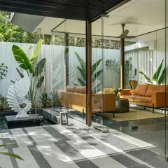 Our design philosophy blurs the line between indoors and outdoors. In this reception area for the Soul Spring project, floor-to-ceiling glass and an integrated water body invite the landscape inside, creating a tranquil and welcoming atmosphere from the moment of arrival.