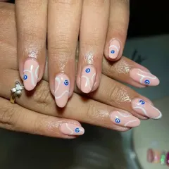 I love it when clients bring me a reference picture. I recreated these evil eye nails and I think the final outcome is even better.