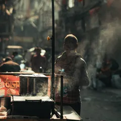 A street food vendor in Chandni Chowk, enveloped in steam. This shot captures the essence of Old Delhi's street life, a place I love to explore with my camera to find authentic, everyday moments.