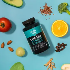 A flat lay for Zingavita's Omega3 + Multivitamins, surrounded by the healthy foods its nutrients are derived from. This "deconstructed" approach visually explains the product's benefits and natural sources.