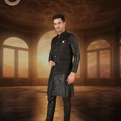 Elevate your ethnic style with this stunning black ensemble, perfect for any special occasion. This look is set against a grand, palatial backdrop.