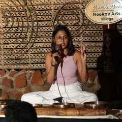 Leading a sound healing session at the NeeRav Arts Village during the Atmarpan Retreat. I use the vibrations of Tibetan bowls to guide participants into a state of deep relaxation and inner peace.