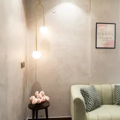 Another view of the globe pendant in the office waiting area, showing how it creates a welcoming and stylish first impression.