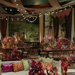 A wide view of the 'Bazaar' seating area, where rich textiles, warm lighting, and intricate decor details come together. The space was designed to feel authentic and vibrant, filled with the sights and sounds of a bustling marketplace.