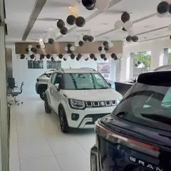 Another angle of the NEXA showroom in Nerul, showing how our decorations complement the new car models on display. Our goal is to create an exciting environment for customers celebrating a new purchase.