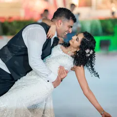 The joy of the first dance. This bride's makeup and hair are set to last through all the celebrations.