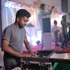 A view from my perspective. Me at the console, with the happy result of my work, a full dance floor, right in front of me.