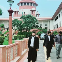 Walking through the Supreme Court grounds with colleagues. Collaboration is a vital part of building a strong case.