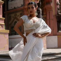 A closer look at the exquisite craftsmanship of our ivory beaded blouse. The detail is simply incredible.