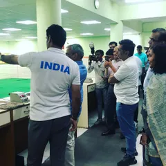It was an honor to host a team from the Delhi judiciary. Here, I am demonstrating the proper shooting stance and technique before they try their hand at air pistol and rifle shooting.